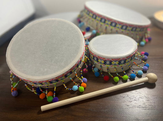 Hand drum with drumstick