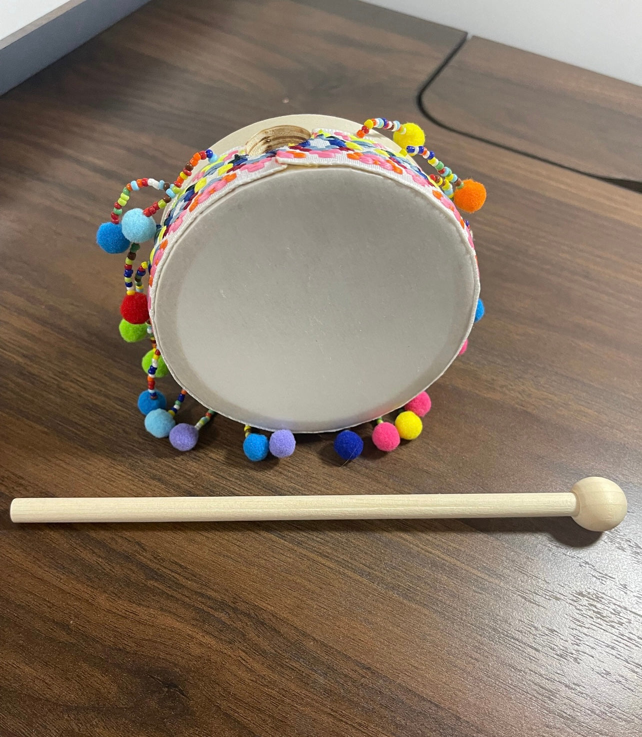 Hand drum with drumstick